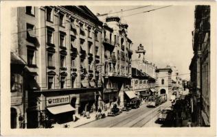 1954 Miskolc, utca, villamos, Csemege, dohánybolt, automobilok, Gyógyszertár anyagraktára, Ibusz iroda. Képzőművészeti Alap