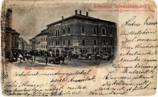 ~1899 Selmecbánya, Schemnitz, Banská Stiavnica; Deák Ferenc utca, Takáts Miklós üzlete, piaci árusok. Nyomta és kiadta Joerges 28. sz. / street view, shops, market vendors (b)