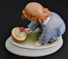 Zsolnay búgócsigás kisfiú, kézzel festett, jelzett (Sinkó András), apró kopásokkal, 16×8,5×12 cm