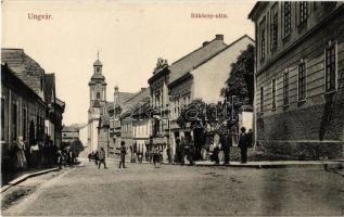 Ungvár, Uzshorod, Uzhorod; Rákóczi utca, Katolikus templom, üzletek. Kiadja Földesi Gyula 1621. / street view, shops, Catholic church (ragasztónyom / glue marks)