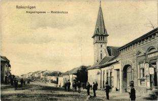 1912 Szászrégen, Reghin; Raktár utca, M. Schuller üzlete, templom / Magazingasse / street, shop, church
