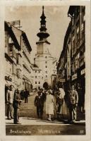 Pozsony, Pressburg, Bratislava; Mihály kapu utca, templom, Bata, Karl Weiner üzlete / Michalská / street view, church, shops. photo