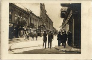 1925 Ungvár, Uzshorod, Uzhorod; Korzó, Dávid Mannheimer, Menyhért Markovits üzlete, kerékpáros / corso, street view with shops, bicycle. Kucek photo