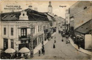 1915 Ungvár, Uzshorod, Uzhorod; Nagyhíd utca és Rákóczi utca, üzletek. Kiadja Steinfeld Dezső 4898. / street view with shops (szakadás / tear)