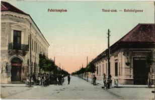 1912 Fehértemplom, Ung. Weisskirchen, Bela Crkva; Vasút utca, Nikolaus Miutza és Rudolf Schönborn üzlete / Bahnhofgasse / street view with shops