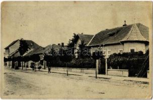 1938 Zselíz, Zeliezovce; utcakép, Bata üzlet, kerékpár. Kiadja Ernő Laufer / street view, shop, bicycle (EB)