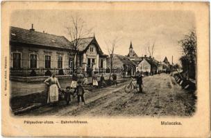1909 Malacka, Malacky; Pályaudvar utca, kerékpáros. Kiadja Wiesner Alfred 4. / Bahnhofstrasse / street view, man with bicycle (EB)
