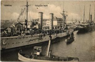 Qingdao, Tsingtau, Kiautschou Bay concession; warship with drying clothes and Falke steam barge (EK)