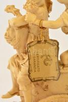 Jelzett (G.A) udvarló kisfiú, műgyanta, apró repedéssel, fa talapzaton, m: 22 cm