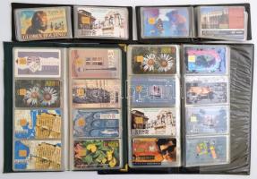 1994-2004 Vegyes telefonkártya tétel, kb. 100 db, használtak, 4 db berakóban.