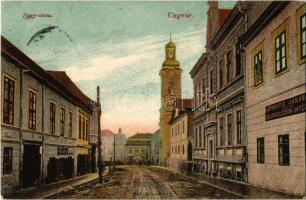 Ungvár, Uzshorod, Uzhorod; Nagy utca, Katolikus templom, Lefkovits Jakabné Zálogkölcsön Intézete, F. Adolf üzlete. Völgyi József kiadása / street view with church, shop, loan institute + Királyháza-Miskolcz-Budapest 350. vasúti mozgóposta bélyegző