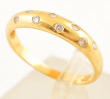 Arany (Au. ) 14 K karikagyűrűk apró brillekkel, méret:59, jelzett, bruttó: 2,6 g