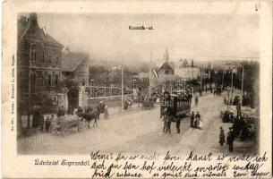 1906 Sopron, Oedenburg; Kossuth út, feldíszített villamos magyar címerrel, Varga és Dukász üzlete, villa, piac. Kiadja Kummert L. utóda 227. (r)