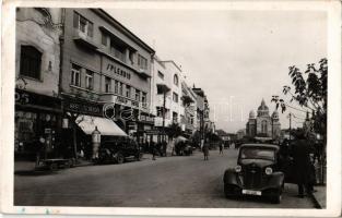 1941 Marosvásárhely, Targu Mures; Fő tér, Splendid szálloda, Kertész Rezső, Révész Béla üzlete, automobilok / main square, hotel, shops, automobiles (EK)