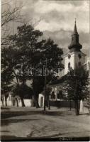 Csákvár, utcakép a református templommal. photo