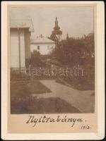 1913 Nyitrabánya (ma: Handlová), háttérben a katolikus templom, fotó, kartonra ragasztva, feliratozva, 9×7,5 cm / Handlová, Slovakia, Catholic church, photo on cardboard