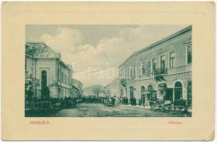 1910 Munkács, Mukacheve, Mukachevo, Mukacevo; Fő utca, zsinagóga, Ipar Testületi iroda, szálloda, Ornstein és Wermelstein Dávid üzlete. W.L. Bp. 1182. / main street with shops, hotel and synagogue (EK)