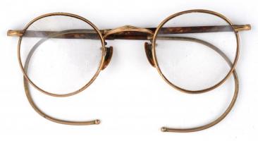 Régi jelzett fémkeretes szemüveg, rugós szárral, rozsdás tokban h:11 cm