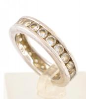 Ezüst(Ag) gyűrű, apró kövekkel díszítve, jelzett, méret: 56, bruttó: 6 g