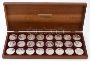 Nagy-Britannia ~1980. Life of Jesus Series (Jézus élete sorozat) peremen jelzett Ag emlékérmek (24xklf) eredeti fa díszdobozban (~50gx24/0.925/45mm) T:PP ujjlenyomat, fo., kis patina / Great Britain ~1980. Life of Jesus Series Ag commemorative medallions hallmarked on edge (24xdiff) in original wooden display case (~50gx24/0.925/45mm) C:PP fingerprint, spotted, small patina