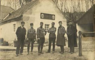 Magyar vasutasok ismeretlen településen / Hungarian railwaymen in an unidentified town. photo (fl)