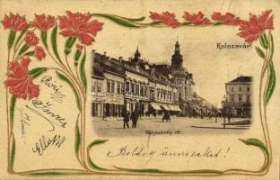 1901 Kolozsvár, Cluj; Mátyás király tér, New York szálloda, Schuster Emil, Hanitz Sándor, Dániel Antal, Hubay Károly üzlete, Wolff J. gyógyszertára. Szecessziós virágos dombornyomott litho keret / square, hotel, shops, pharmacy. Art Nouveau, floral, Emb. litho frame