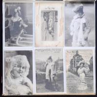 Kb. 108 db RÉGI motívumlap albumban: főleg magyar színésznők / Cca. 108 pre-1945 motive postcards in an album: mostly Hungarian actresses