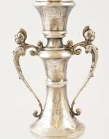Ezüst (Ag.) gyertyatartó párban, jelzett, mesterjeggyel (A.P.), vésett díszítésekkel, apró horpadáso...