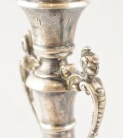 Ezüst (Ag.) gyertyatartó párban, jelzett, mesterjeggyel (A.P.), vésett díszítésekkel, apró horpadáso...