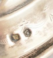 Ezüst (Ag.) gyertyatartó párban, jelzett, mesterjeggyel (A.P.), vésett díszítésekkel, apró horpadáso...