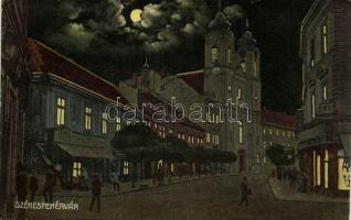 1914 Székesfehérvár, utca este, templom, Deutsch és Rosenberg üzlete. Robicsek Sándor kiadása (EK)