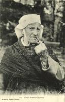 Old Breton woman smoking a pipe, French folklore