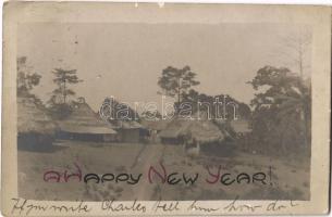 1918 Freetown, huts, African folklore. Happy New Year greeting. photo