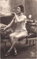 Lady, vintage erotic postcard. Made in France (crease)