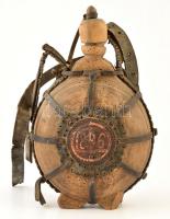 Régi fa díszkulacs, bőr szíjakkal, díszítéssel, a bőrön 1896-os évszámmal, sérült, megviselt állapotban, szúnyomokkal, m: 34,5 cm