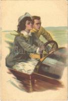 Couple in an automobile, art postcard