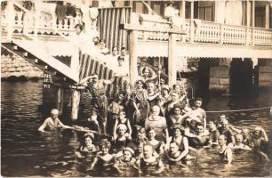 1913 Abbazia, Opatija; fürdőzők csoportképe, lány korabeli úszógumival / bathing people in the sea, girl with early swimbelt. H. Porkert photo