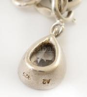 Ezüst(Ag) karkötő, charmokkal, jelzett, h: 19 cm, bruttó: 17,8 g