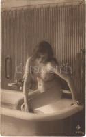 Erotic nude lady bathing. photo (pinholes)