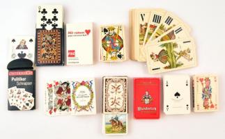 10 csomag érdekes és többféle kártya tétel, többek közt egy játékkártyagyár és nyomda (36 db), egy Mlle. Lenormand Piatnik jóskártya
