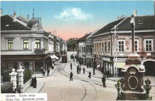 Újvidék, Novi Sad; Dunavska ulica / Duna utca, villamos, üzletek. Svetozar F. Ognjanovic kiadása / street view, tram, shops