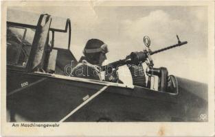 1942 Am Maschinengewehr / WWII German military pilot with machine gun (tear)