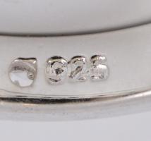 Ezüst(Ag) fekete-fehér sokköves gyűrű, jelzett, méret: 57, bruttó: 4 g