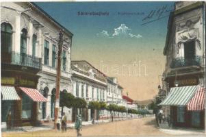 1917 Sátoraljaújhely, Korona utca, Klein és Tomka üzlete, férfi ruha terem. 389. Vasúti levelezőlapárusítás