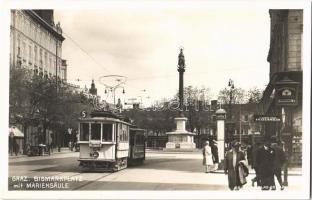 Graz, Bismarkplatz mit Mariensäule, Buchsenmacher H. Bradler / square, tram, monument, shops, automobile