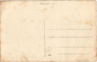 Lőrinci, Római katolikus templom, férfi kerékpárral. photo (EK)