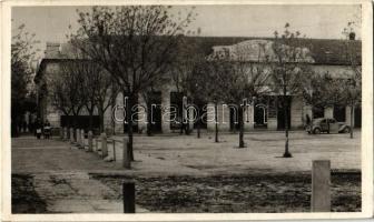 1941 Kúla, Bács-Kula, Kula; Bérpalota, magyar üzlet, könvynyomda és könyvkötészet, automobil / street view, Hungarian shop, publishing house, automobile