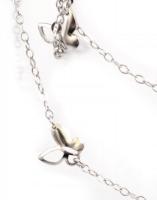 Ezüst(Ag) áttört pillangómintás nyaklánc, jelzett, h: 76 cm, nettó: 12,1 g