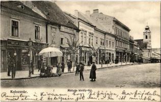 1906 Kolozsvár, Cluj; Mátyás király tér, Stief J. és Társa nagy nyomdai intézete, Ganz és Társa építésvezetősége, Kalap Király, Mattay üzlete, utcai árusok / square, shops, street vendors