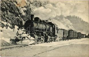 MÁV 651. sor. (VI. III. oszt.) Mallet mozdonya vonat előtt télen. Építette a MÁV gépgyár Budapest 1912. Gőzmozdony Szaklap kiadása / Hungarian State Railways locomotive with train in winter (EB)
